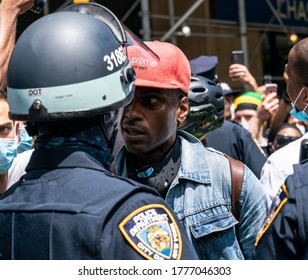 New York, NY - July 15, 2020: BLM protesters confront police at the Jericho The Power of Prayer rally and march against gun violence at City Hall 