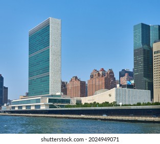 New York, NY - July 27, 2021: The United Nations Headquarters Buildings In Manhattan, NYC. The Buildings Are Seen From The East River. Prominent Is The 39 Story UN Secretariat Building (1952)