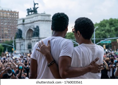 New York, NY - June 19, 2020: Matt Whitaker, Jon Batiste aknowledge protesters after 'We Are: a Voter Registration' recital during Juneteenth celebration at Brooklyn Public Library on Grand Army Plaza