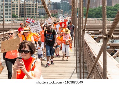 New York, NY - June 2, 2018: New Yorkers march during Youth Over Guns March across the Brooklyn Bridge