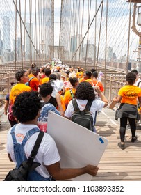 New York, NY - June 2, 2018: New Yorkers march during Youth Over Guns March across the Brooklyn Bridge