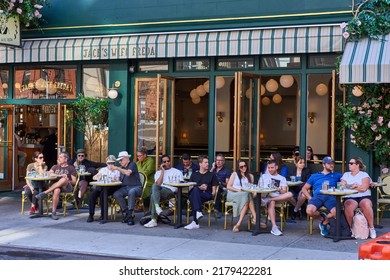 New York, NY - June 29, 2022: Diners Sitting At A Sidewalk Cafe On Lafayette St In Nolita NYC. It Is Called Jack's Wife Freda Restaurant.
