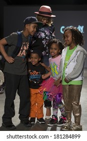 New York, NY - March 08, 2014: Designer Amber Sabathia & Her And CC Sabathia Children Walk Runway For CCandy By Amber Sabathia At Vogue Bambini PetiteParade Kids Fashion Week At Center 545