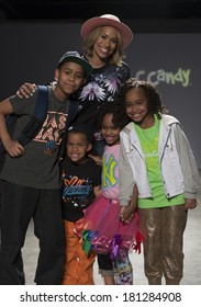 New York, NY - March 08, 2014: Designer Amber Sabathia & Her And CC Sabathia Children Walk Runway For CCandy By Amber Sabathia At Vogue Bambini PetiteParade Kids Fashion Week At Center 545