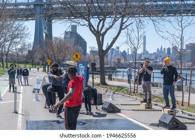 NEW YORK, NY - MARCH 30: Members of The Missing Element performs in Astoria Park as part of NY PopsUp on March 30, 2021 in Queens Borough of New York City.