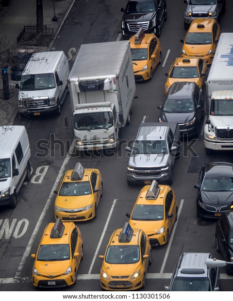 New York, NY: March 9, 2018-Traffic on\
Lexington Avenue on the Upper East Side\
