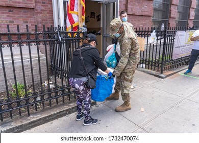 NEW YORK, NY - MAY 15:  US Army National Guard Hand Out Food And Other Essentials For People In Need At A Food Pantry Amid The COVID-19 Pandemic On May 15, 2020 In Queens Borough Of New York City.