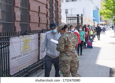 NEW YORK, NY - MAY 15:  US Army National Guard Hand Out Food And Other Essentials For People In Need At A Food Pantry Amid The COVID-19 Pandemic On May 15, 2020 In Queens Borough Of New York City.