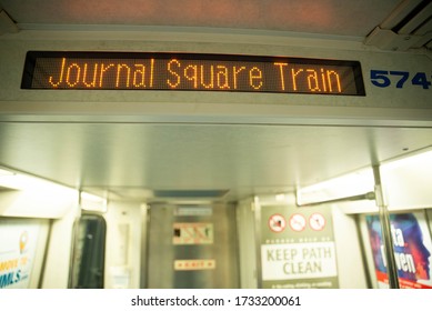 New York, NY - May 16 2020: The Path Train Going From New Jersey To NYC Sign Saying Via Hoboken Stopping At Journal Square 