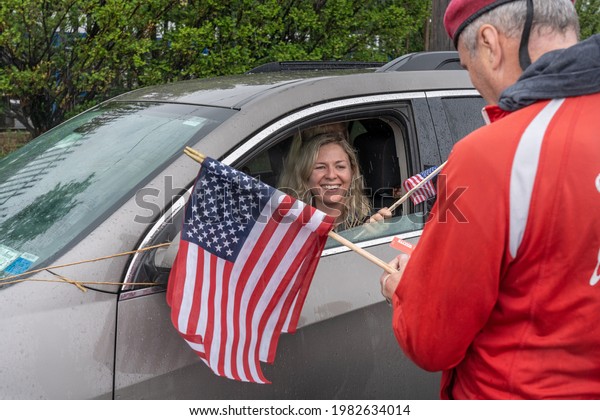 NEW YORK, NY – MAY 30: New York mayoral candidate\
Curtis Sliwa talks to participants in the annual College Point\
Memorial Day Car Parade held College Point, Queens on May 30, 2021\
in New York City.