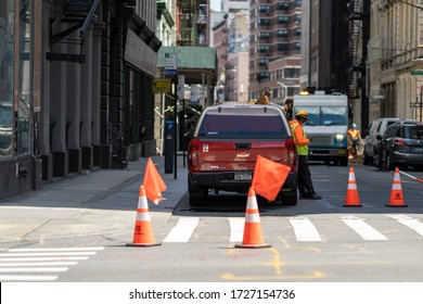 New York, NY - May 7, 2020: Utilities Construction In Downtown Manhattan.  Worker On Phone