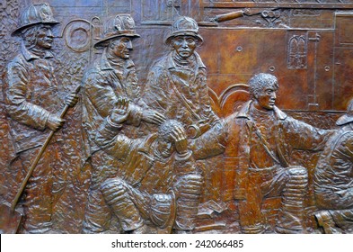 NEW YORK, NY OCT 23, 2013: The Memorial Wall, Located At FDNY Engine 10 Ladder 10, Directly Across From The World Trade Center Site. It's Dedicated To The 343 Members Of The NYFD Who Died On 9/11.