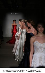 NEW YORK, NY - OCTOBER 12: Models walk the runway finale at the Anna Maier / Ulla-Maija Couture Fall 2014 Bridal collection show at the Hilton New York on October 12, 2014 in New York City.