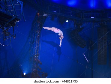 New York, NY - October 29, 2017: Estefani Tuniziani performs Flying Trapeze act at Big Apple Circus opening night at Lincoln Center Damrosch Park