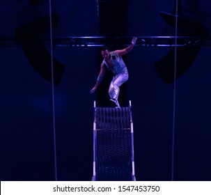 New York, NY - October 31, 2019: Jayson Dominguez Performs On Wheel Of Death During Halloween Ball At Big Apple Circus At Lincoln Center