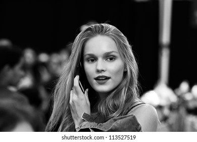 NEW YORK, NY - SEPTEMBER 10: A Model Talks On Cell Phone During The Carlos Miele Spring Summer 2013 Fashion Presentation During Mercedes Benz Fashion Week On September 10, 2012 In New York City, USA