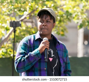 New York, NY - September 20, 2019: Youth activist 20-year old Vic Barrett speaks on stage during NYC Climate Strike rally and demonstration at Foley Square