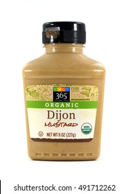 NEW YORK, NY - SEPTEMBER 25th, 2016: Plastic Bottle Of Whole Foods 365 Brand Organic Dijon Mustard