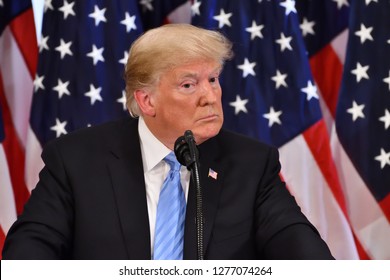 NEW YORK, NY - SEPTEMBER 26, 2018: President Donald Trump listens to a reporters question at a press conference held at the Lotte Palace Hotel during the UN General Assembly.