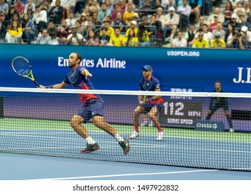 New York, NY - September 6, 2019: Juan Sebastian Cabal, Robert Farah (Colombia) in action at US Open Championships mens doubles final at Billie Jean King National Tennis Center