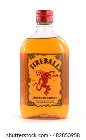 NEW YORK, NY - SEPTEMBER 8th, 2016: 750ml bottle of Fireball Cinammon Whiskey, isolated on white background