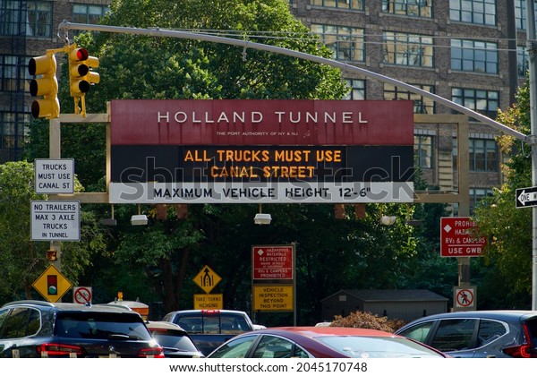 New York, NY  United
States - September 18 2021: Holland Tunnel sign and traffic. New
York City side.