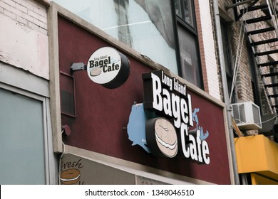 NEW YORK, NY, USA - APRIL 8, 2016:  Long Island Bagel Cafe Sign. View From Fulton Street On Lower Manhattan.