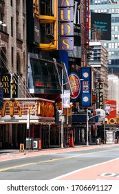 New York, NY / USA - April 16 2020: Almost Empty Road In Times Square. City Lockdown During Coronavirus Pandemic. Vertical View