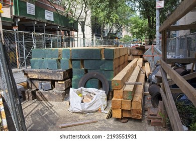 New York, NY, USA - Aug 23, 2022: Wooden Beams And Other Construction Equipment Used To Replace Aging Underground Gas Lines