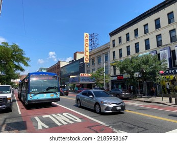 New York, NY USA - August 2, 2022 : A View Of The M60 Select Bus Driving Down The Bus Lane In Front Of The Apollo Theater On 125th Street In Harlem