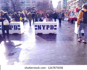 New York, NY / USA - December 24 2018: At Union Square, NYPD Police Barricades Protect The Urbanspace Union Square Holiday Market From Vehicular Attacks On Shoppers And Visitors