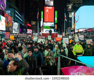 New York, NY / USA - December 17 2019:  Anti-Trump Impeachment Rally In Times Square, Article II, Section 4