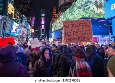 New York, NY / USA - December 17 2019:  Anti-Trump Impeachment Rally In Times Square, Article II, Section 4