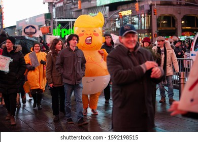 New York, NY / USA - December 17 2019:  Anti-Trump Impeachment Rally In Times Square, Article II, Section 4