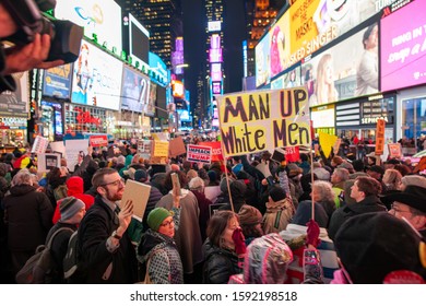 New York, NY / USA - December 17 2019:  Anti-Trump Impeachment Rally In Times Square, Article II, Section 4