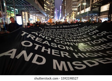 New York, NY / USA - December 17 2019:  Anti-Trump Impeachment Rally In Times Square, Article II, Section 4