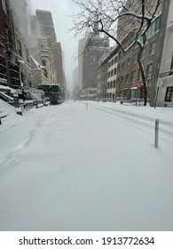 New York, NY USA - February 1, 2021: New York City, Empty Snow-Covered Streets Of Midtown Manhattan During  Noreaster Blizzard