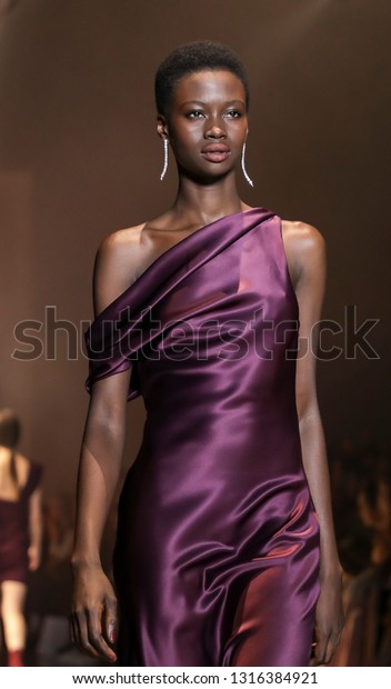 New York, NY, USA - February 8, 2019:\
A model walks runway for Cushnie Fall/Winter 2019 collection during\
New York Fashion at Spring Studios,\
Manhattan