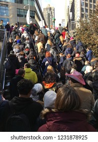 New York, NY, USA January 20, 2018 A Large Group Of Protestors Climb The Stairs From The New York Subway To Participate In The Women's March