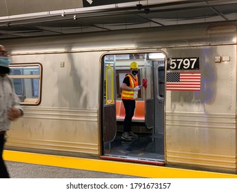 New York, NY / USA - July 24, 2020: Man In Deep Cleaning Crew Inside New York City Subway During Covid-19 Pandemic Phase 4