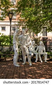 New York, NY - USA - July 30, 2021: View of the sculpture Gay Liberation by American artist George Segal, located in Christopher Park along Christopher Street in the West Village section of Manhattan.