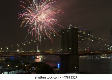New York, NY USA - July 4, 2016: View Of 40th Annual Macys 4th Of July Fireworks On East River With Brooklyn Bridge On Foreground