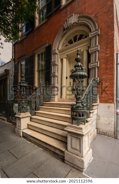 New York, NY - USA - July 30,\
2021: view of the 1832 late-Federal brick  Merchant\'s House Museum,\
a preserved 19th-century home of a wealthy merchant\
family.
