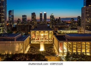 New York, NY USA - June 1, 2017. Sunset view of Lincoln Center Opera House and New York City skyline.