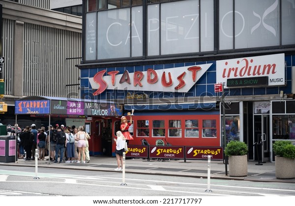 New York, NY, USA -\
June 3, 2022: Ellen\'s Stardust Diner, a 1950s theme restaurant in\
the Theater District.