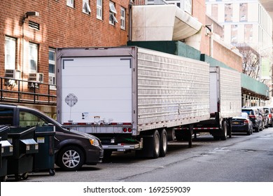 New York, NY / USA - March 29 2020: Makeshift Morgue, Refrigerated Trucks Near The Bellevue Hospital Center During Coronavirus Pandemic City Lockdown