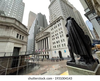 New York, NY  USA - March 1, 2021: New York City, Wall Street and Statue of George Washington 