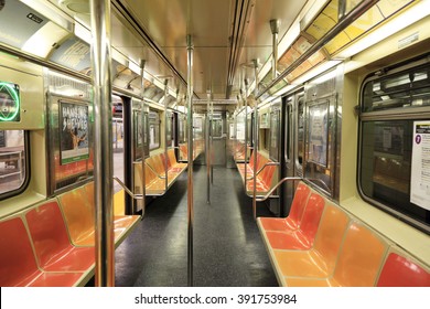 New York, NY, USA - March 15, 2016: Inside of subway wagon: Colorful seats and inside of empty car: The NYC Subway is one of the oldest and most extensive public transportation systems in the world.