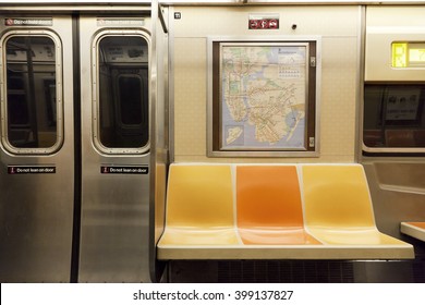 New York, NY, USA - March 11, 2016: Inside of subway wagon: Colorful seats and inside of empty car: The NYC Subway is one of the oldest and most extensive public transportation systems in the world.
