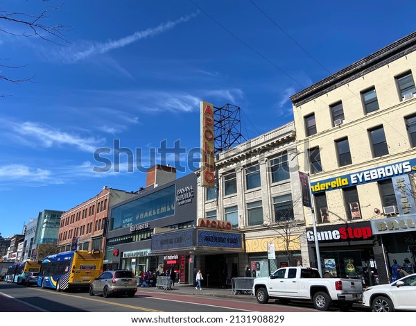 New York, NY USA - March 3, 2022 : A view of\
the historic Apollo Theater and the buildings around it on 125th\
Street in Harlem, New York,\
USA